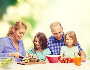 happy family with two kids making dinner at home