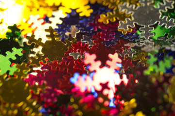 Celebratory background paper Snowflakes multi-coloured. Macro