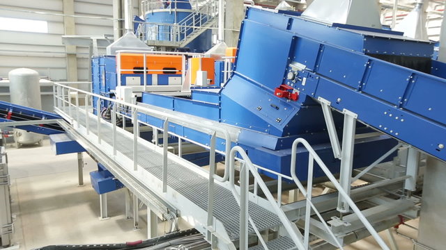 New modern industrial waste plant pipelines from the outside. Waste-to-energy plant. Produces a combustible fuel commodity, such as methane, methanol, ethanol and synthetic fuels.