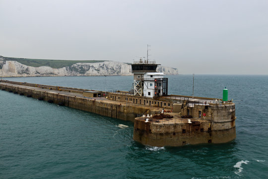 Man-made breakwater structure at port entry