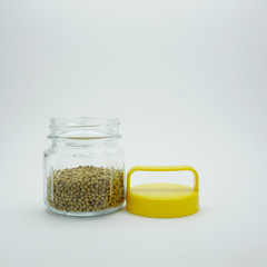 Pepper In Bottle with yellow cap on white background. (#2) 