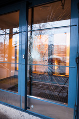 Fototapeta premium Broken glass front door