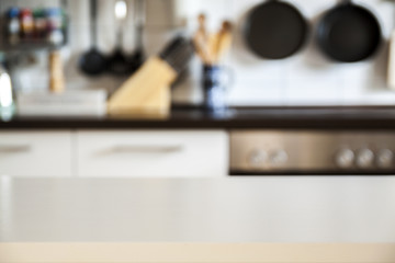 Empty white table and more blurred kitchen background, product display