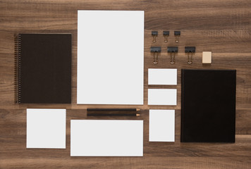 Mockup business brand template on wooden desk background.