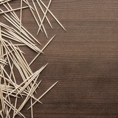 wooden toothpicks on the table background