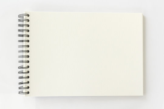 spiral watercolor book on white background