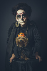 Portrait of woman and dog in disguise for Halloween