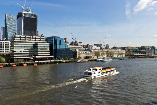 Water taxi on the River Thames in Central London, England