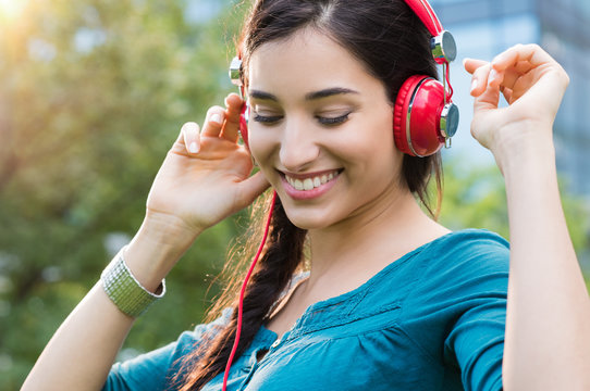 Woman listening to music and dancing
