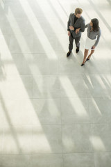 People at the hall in office building