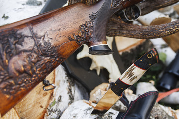 Rifle with hunting knife
