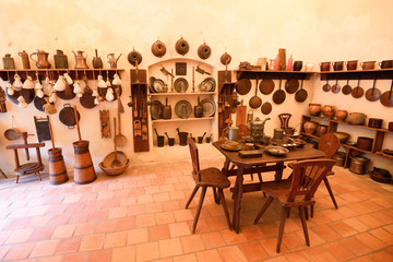 Old medieval castle kitchen with variety of dishes