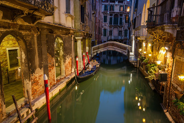 view into a small canal in Venice at night, Italy, Europe