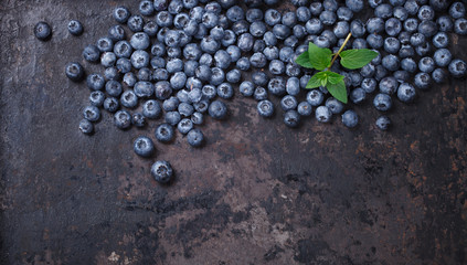 Blueberries on a dark background.Copy space for your text. Healthy food.selective focus