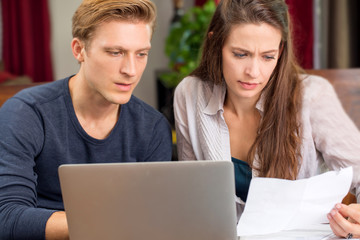 Couple paying bills