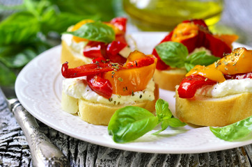 Toasts with brynza and grilled sweet pepper.