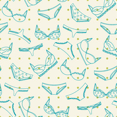Underwear seamless pattern with green dots. Bras and panties