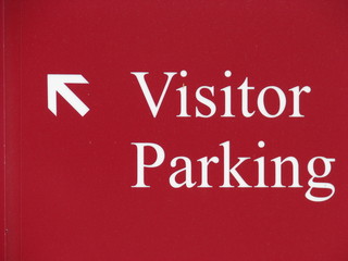 Red Visitor Parking Sign