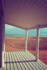 Fototapeta na wymiar Beach house porch white vintage filter background