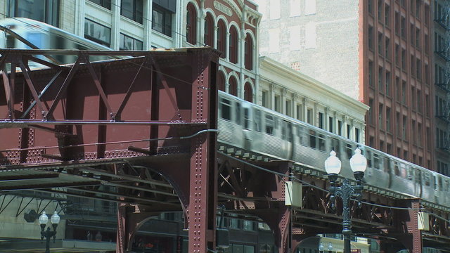 Elevated trains cross paths in Chicago