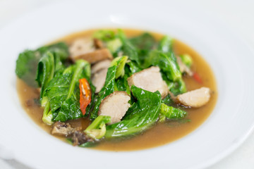 Fried kale with crispy pork, Thai food menu