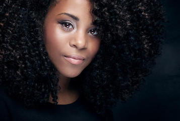 Beauty portrait of young girl with afro.