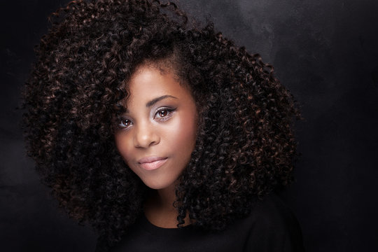 Beauty portrait of young girl with afro.