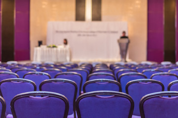 speaker prepares to lecture before people come meeting room