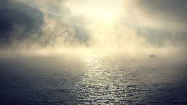 Foggy sunrise on the lake.
