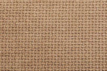 Background of brown fabric texture, close-up.