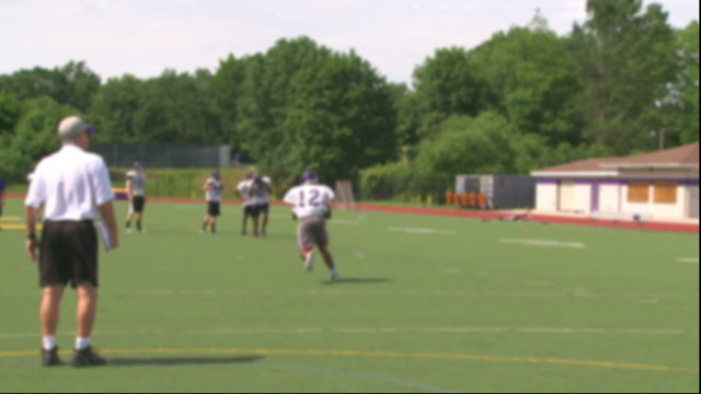 High school football team at practice 