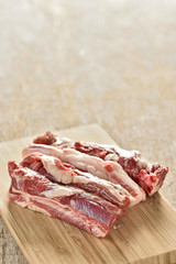 Fresh raw side beef on wood plate