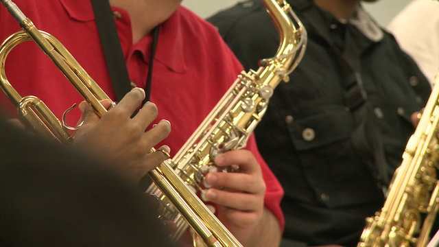 Students playing instruments in music class