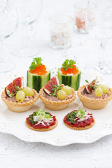 Assorted holiday mini appetizers, vertical