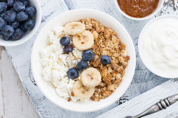 Healthy delicious breakfast with cottage cheese, muesli 