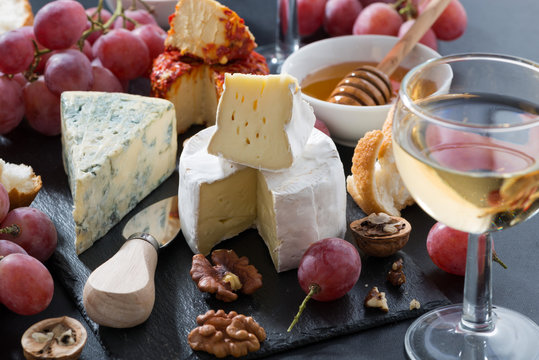 molded cheeses, wine and snacks