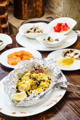 fish with vegetables in the foil