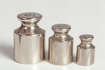 Three metal weights