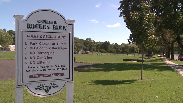 Sign with local park regulations