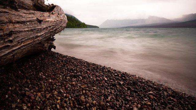 stormy waters and clouds on lake mcdonald in glacier national park