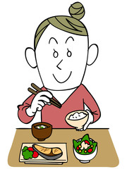 食事する女性