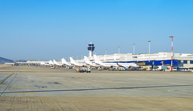Many passenger planes in the airport.