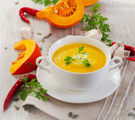 A bowl of spicy pumpkin soup