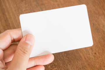 Obraz premium Hand holding a business card