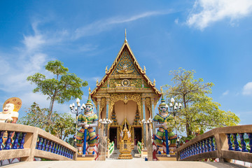 Naklejka premium Buddhist pagoda, part of temple complex Wat Plai Laem on Samui island. Thailand, Koh Samui
