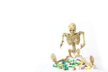 Stock Photo:. Human skeleton and Overdosing