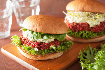 veggie beet and quinoa burger with avocado dressing