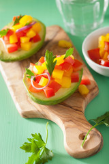 avocados stuffed with tomato pepper salad