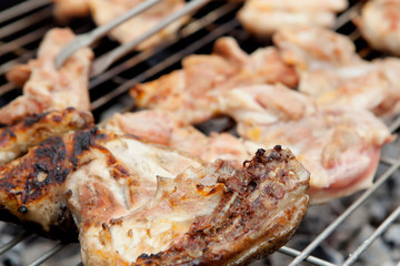 Chicken and sausages on the barbecue