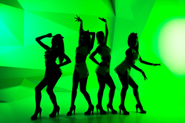 Fototapeta na wymiar silhouette of a dancing girls